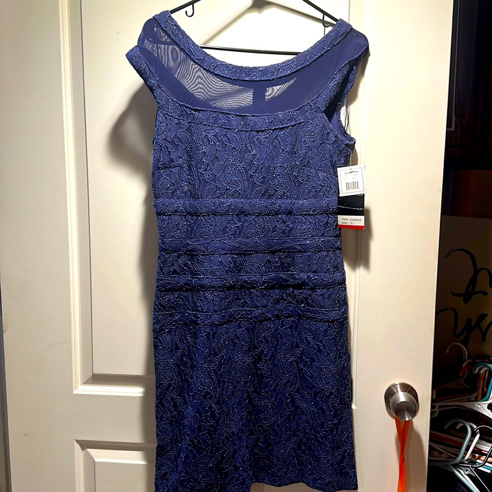 Never worn Woman’s size 6 Blue Special Occasion/Party Dress